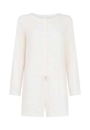 Biały, prążkowany kombinezon z długim rękawem, zapięciem na guziki z przodu i rozciągliwą tasiemką w talii. Miękka struktura z luźnym krojem i krótkimi nogawkami.