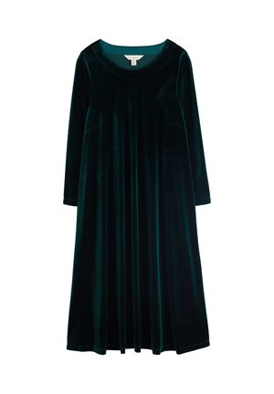 Vestido de terciopelo verde con mangas largas y escote redondo. Presenta un corte holgado y bolsillos laterales, con una textura suave y sedosa.