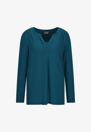 Langärmlige tealfarbene Bluse mit V-Ausschnitt und lockerer Passform, auf einem weißen Hintergrund präsentiert.