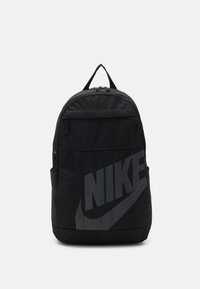 Black backpack with a rounded shape, made from durable fabric. Features a large gray Nike logo and a top zip closure. Simple design, no patterns.