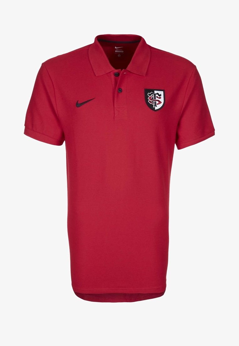 Polo rouge Nike avec logo noir sur la poitrine droite et emblème bouclier noir, blanc et rouge sur la poitrine gauche.