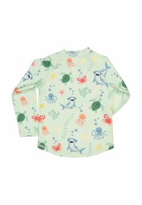 Long-sleeve rash guard in light green with aquatic-themed patterns, including turtles, sharks, and jellyfish in various colors.