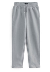 Pantalones de chándal grises con cintura elástica y cordón ajustable. Hechos de una tela suave y lisa, con un corte de pierna recta.