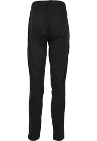 Schwarze Sporthose aus leichtem Stoff mit elastischem Bund, schmal zulaufendem Bein und glatter Textur. Keine sichtbaren Taschen.