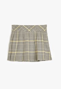 Jupe à carreaux comprenant des nuances de gris, de jaune et de noir. Fabriquée en tissu texturé, elle présente un design plissé et une taille ajustée.