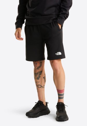 - Spodnie treningowe