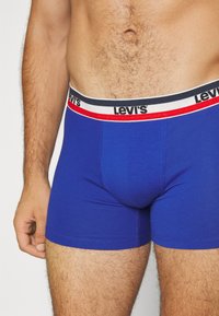 Levi's® MEN LOGO 3 PACK - Boxer alsónadrág - red/blue/yellow