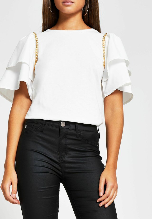 T-shirt con stampa - cream