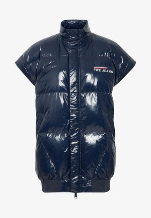 Gilet rembourré navy à finition brillante, col montant, manches courtes et ourlet côtelé. Présente un logo sur la poitrine.