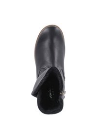 Bottine en cuir noir avec une doublure en fourrure douce, un revers replié et une fermeture éclair sur le côté. Présente une surface texturée et une semelle marron clair.