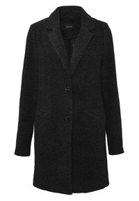 Lång svart kappa i texturerat tyg, med slagkrage, två knappar och sidofickor. Ren, strukturerad siluett.