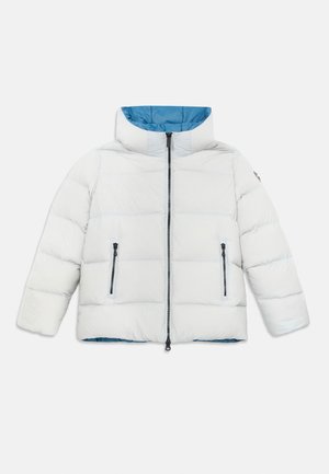White puffer jacket with high collar, blue inner lining, two front zippered pockets, and black center zipper on a white background.
