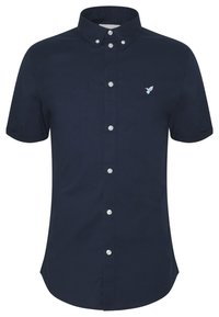 Camicia azzurra a maniche corte con bottoni, colletto con bottoni e piccolo logo di un uccellino ricamato in bianco sul petto.