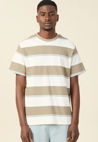 Gestreept t-shirt van gestructureerd katoen, met horizontale banden in beige, wit en lichtblauw. Ronde hals en korte mouwen.