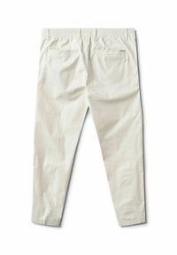 Svetlo béžové bavlnené nohavice s hladkým povrchom, elastickým pásom a dvoma zadnými vreckami. Slim fit dizajn s zužujúcou sa nohavicou.