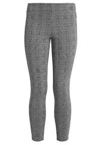 Stretch leggings with a black and white plaid pattern, featuring a smooth texture and a fitted design that tapers at the ankle.
