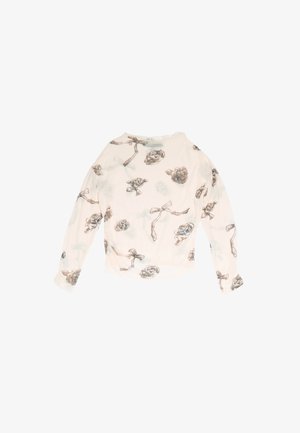 Camiseta ligera de manga larga en color crema claro con un estampado floral de rosas grises y lazos, que presenta un corte holgado y cuello redondo.