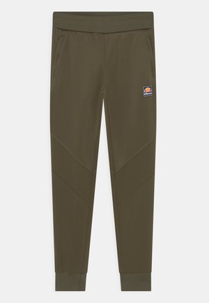 Pantalon de survêtement fuselé vert olive avec panneaux côtelés aux genoux, taille élastique, poches latérales, poignets et patch logo Ellesse sur la cuisse.