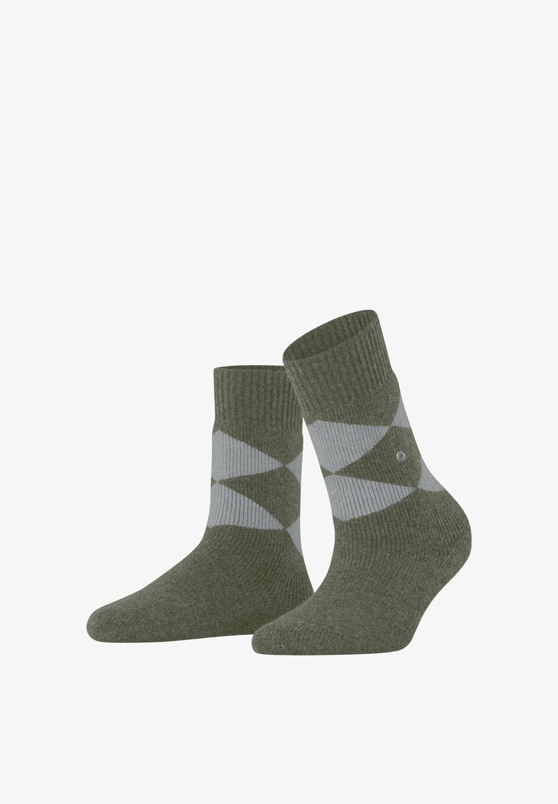 Grüne gerippte Socken mit einem Diamantmuster in Hellgrau, und einem Logo-Akzent an der Seite. Mittellange Knöchellänge und weicher Textur.