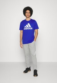 adidas Sportswear Apdrukāts T-krekls - semi lucid blue