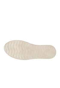 Semelle d'une semelle intérieure, de couleur beige clair, présentant un motif ondulé texturé pour l'adhérence et le confort. Bout et talon arrondis pour plus de confort.