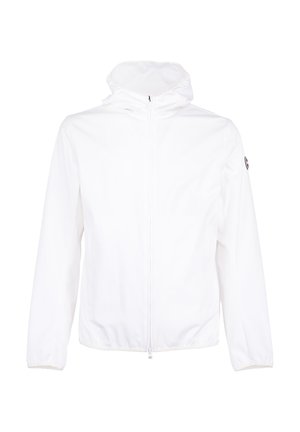 Giacca bianca con cappuccio e maniche lunghe, dotata di cerniera frontale e polsini elastici, con un piccolo logo circolare sulla parte superiore della manica sinistra.