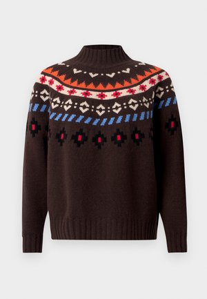 Tumepruun kudumistega kampsun kõrge kraega, millel on oranži, punase, valge, sinise ja musta mitmevärvilised geomeetrilised mustrid rinnal ja varrukatel.