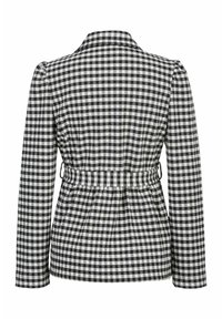 Zwart-wit geruite jas met lange mouwen, een kraag en een ceintuur in de taille. De stof heeft een gingham patroon en een gestructureerd ontwerp.