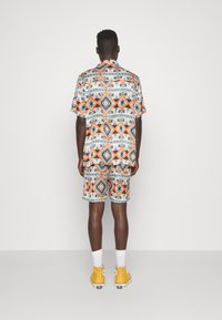Heathe PRINTED SHIRT SET - Kratke hlače - tribal