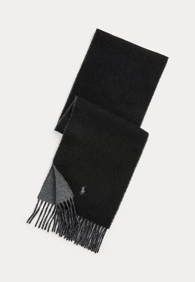 Black and dark gray wool scarf with fringed ends and small embroidered logo near one end.