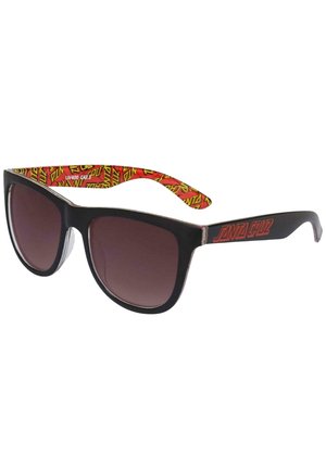 Gafas de sol negras con lentes degradados y un diseño geométrico en las varillas con patrón rojo y amarillo. Presentan un atrevido logo de "Santa Cruz".