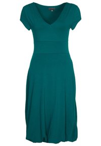 Teal mekko polven mittaan, joka on valmistettu pehmeästä materiaalista. Siinä on lyhyet hihat, V-pääntie ja istuva yläosa, joka laskeutuu levenevään hameeseen.
