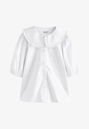 Biela blúzka s dlhým rukávom s veľkým zaobleným volánovým golierom a prednými gombíkmi, s nariasenými rukávmi a elastickými manžetami.