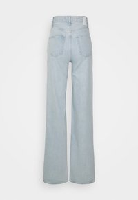 Světle modré džíny s širokými nohavicemi z denimu, s vysokým pasem, pěti kapsami a minimálními švy.