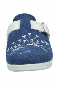 Blue felt clog with white floral embroidery, featuring a white adjustable strap and a contrasting white rubber sole.
