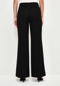 adL WIDE  - Pantaloni - striped black
