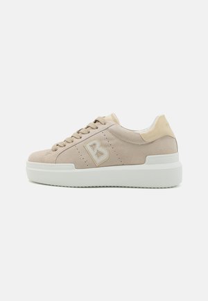 Beige suede sneaker with white rubber sole, round toe, perforated detailing, and side "B" logo. Features smooth beige accents on heel.