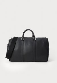 Calvin Klein RAISED LOGO - Sac week-end - black