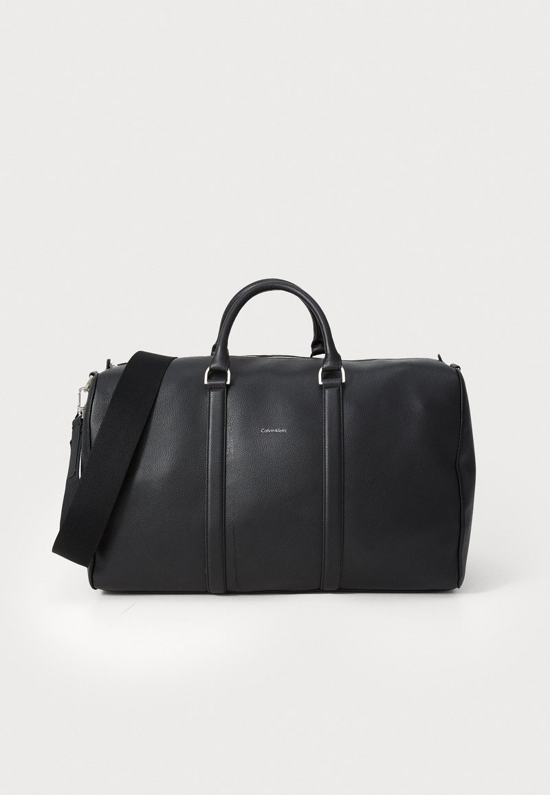 Calvin Klein RAISED LOGO - Sac week-end - black