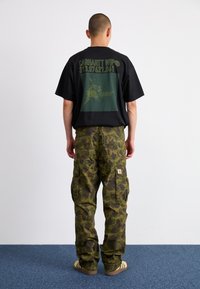 Carhartt WIP DUCK PANT - Pantaloni cargo - green/office green