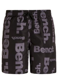 Čierne plavky s veľkým šedým logom "Bench". Majú elastický pás s šnúrkou a hladkú, ľahkú tkaninu.