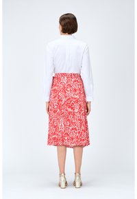 Caroll Gonna a campana - rouge