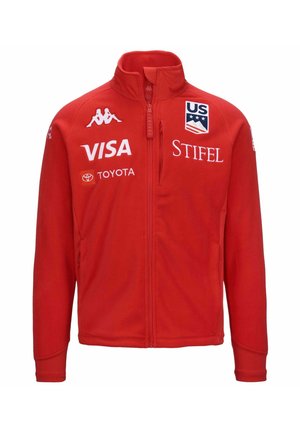 Giacca in pile rossa con colletto alto, zip completa e polsini a coste. Presenta loghi tra cui US Ski Team, VISA e STIFEL. Texture morbida.