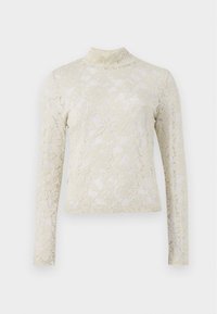 Top in pizzo color crema con colletto alto, maniche lunghe e motivo floreale, caratterizzato da una silhouette aderente e una finitura testurizzata.