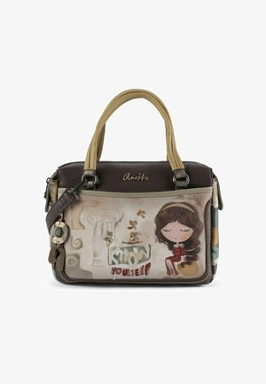 Handbag with a brown textured body and a colorful front design featuring a cartoon girl, gold accents, and the text "Know Yourself."