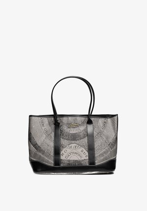Sac fourre-tout noir avec un corps en maille texturée présentant un motif graphique circulaire et des finitions en cuir. Deux poignées robustes pour le transport.