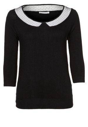 Zwarte trui met driekwartmouwen en een witte Peter Pan-kraag met kleine zwarte stippen.