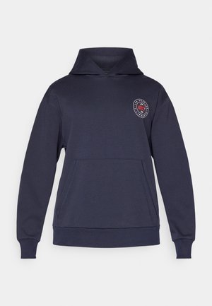 Navy blue hooded sweatshirt made of soft fabric, featuring a front kangaroo pocket and a circular logo on the chest. Ribbed cuffs.