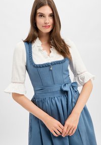 Blue dirndl dress with a fitted bodice, ruffled white blouse, decorative trim, and a bow at the waist. Smooth fabric with gathered skirt.
