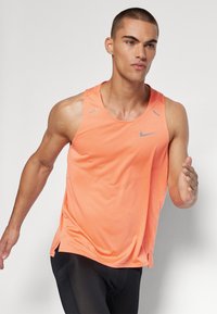 Nike Performance RISE TANK - Top - light wild mango/reflective silver